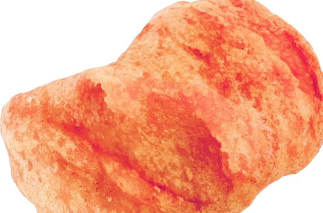 A close-up of a chicken-nuggest-inspire pillow